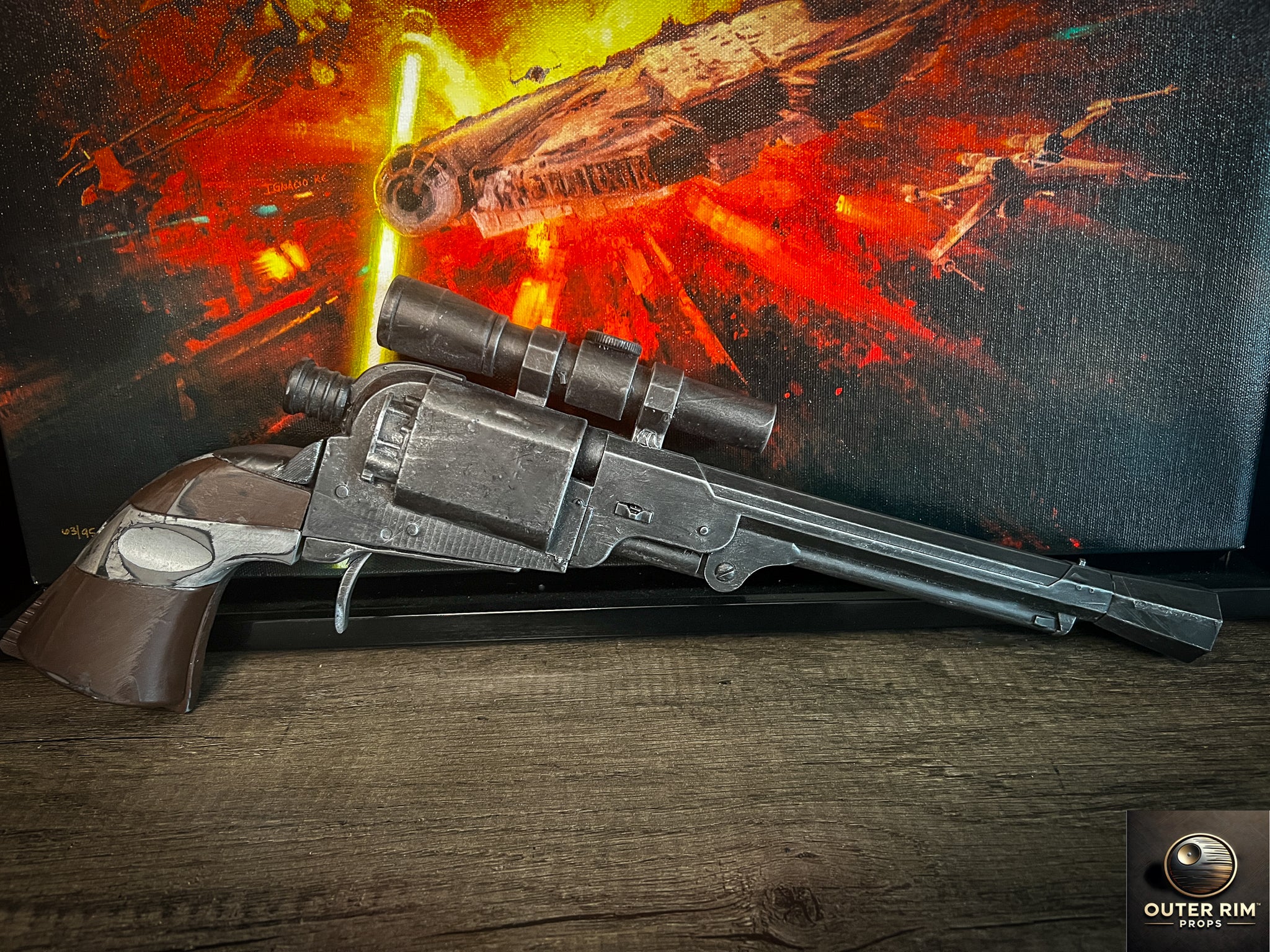 “Cad Bane LL-30 blaster pistol replica displayed at an angle with Star Wars Millennium Falcon battle art in the background.”