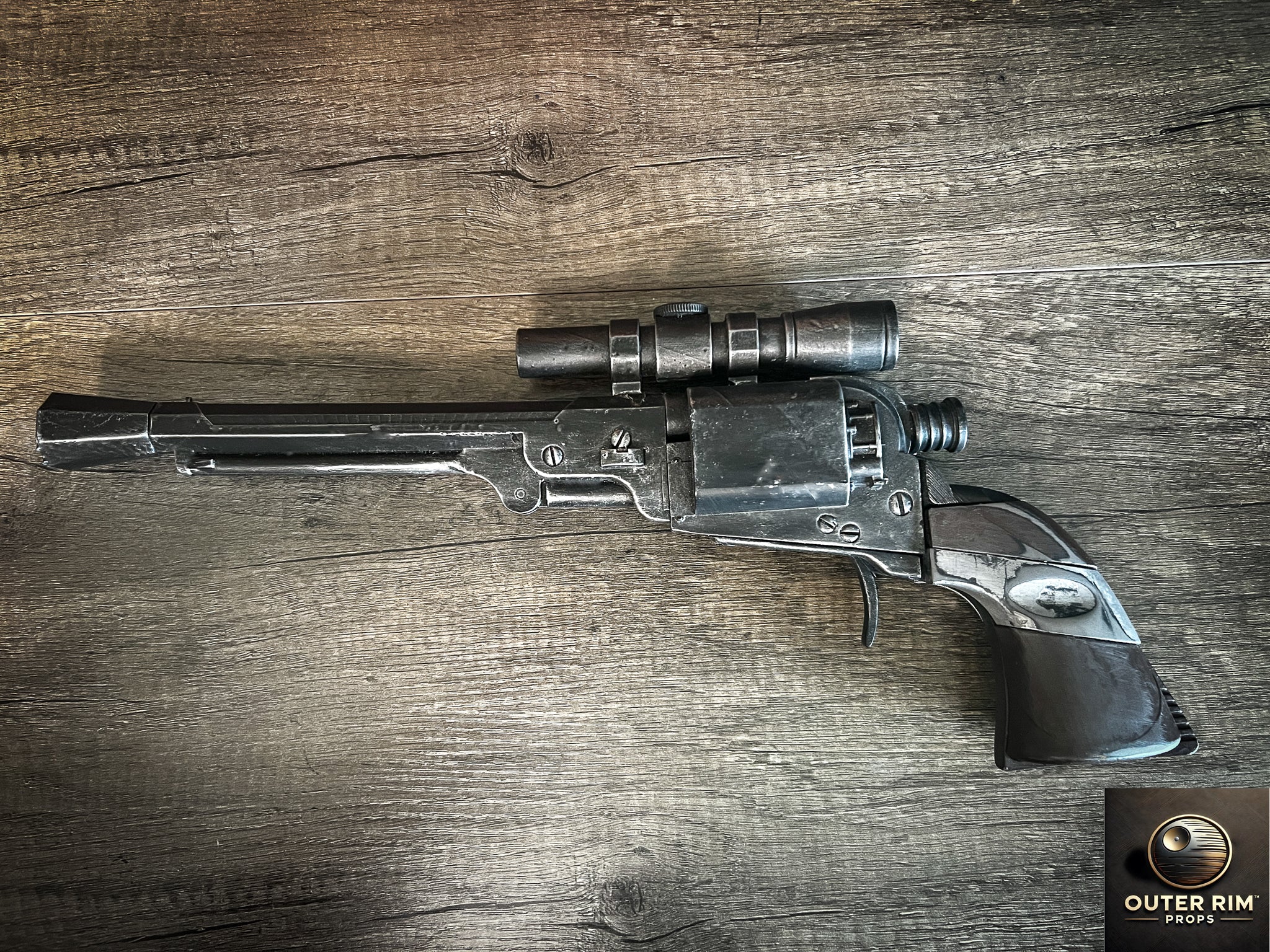 “Close-up of Cad Bane LL-30 blaster pistol replica highlighting scope and barrel craftsmanship.”
