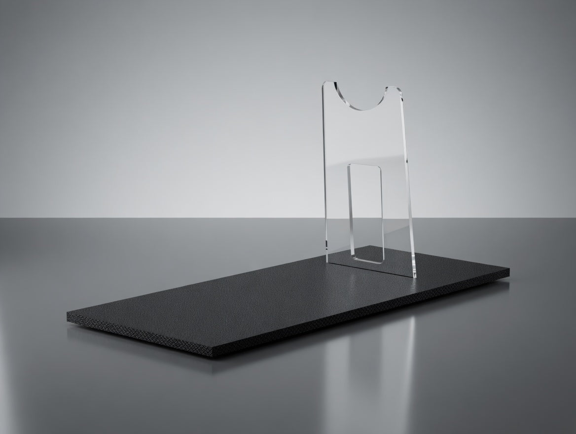 Clear acrylic Leia Defender blaster display stand with textured black base, empty