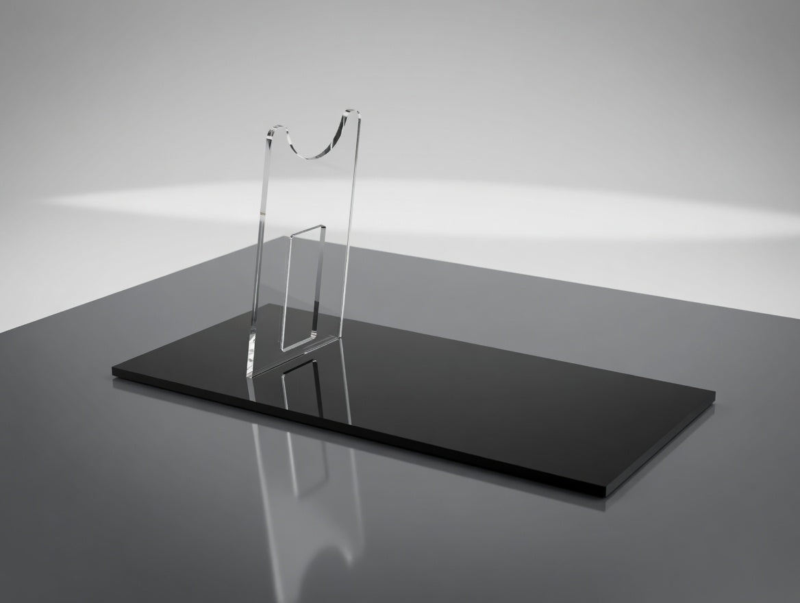 Clear acrylic Leia Defender blaster display stand with textured black base, empty