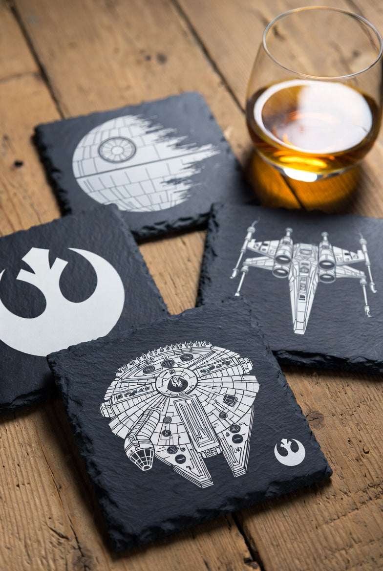 Rebel-inspired engraved slate coaster featuring a stylized uprising symbol from Outer Rim Prop